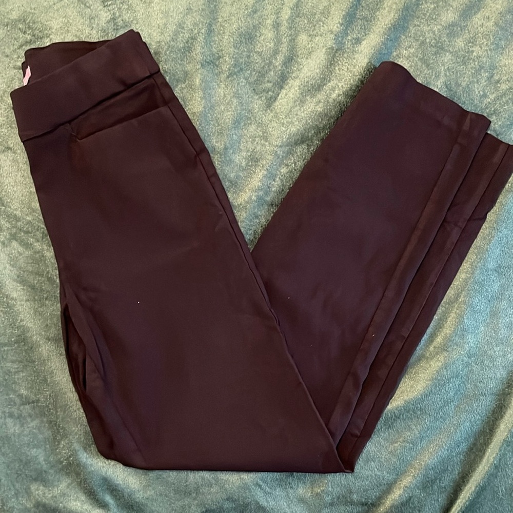 Maurice’s black mid rise trousers